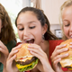 Image for article titled The Best Way to Eat a Stacked Burger
